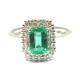 Ring with emerald 7 x 5 ct. 0.97 and diamonds